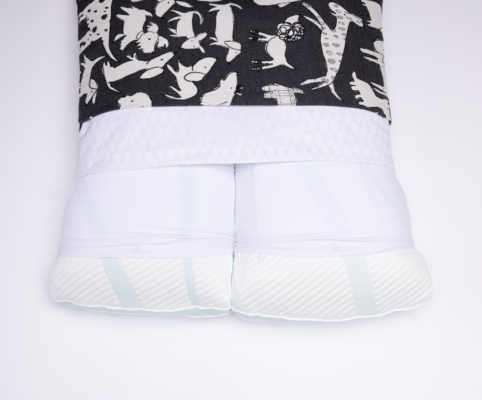 Crafted for comfort - artisan sewing a duvet